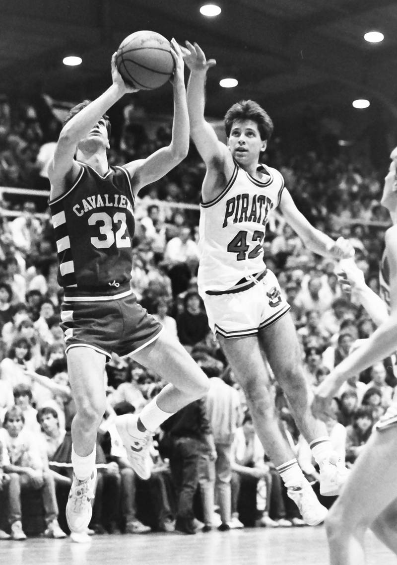 L-P's John Happ lets go of a shot over Ottawa's Rick Hayne during the Regional title game on Saturday, Feb. 28, 1986 at La Salle-Peru Township High School.