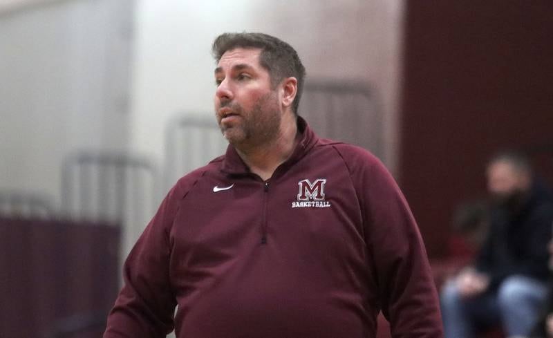 Marengo’s Head Coach Jeremy Burke guides the Indians against Sandwich in varsity boys basketball action on Saturday, Jan..24, 2025, at Marengo High School in Marengo.