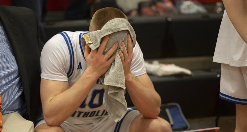 Newman’s George Jungerman reacts to the Comets’ season ending 70-66 to Pecatonica in OT Tuesday, March 3, 2026, in the 1A sectional semifinal.