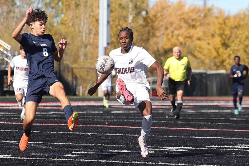 Bolingbrook’s Kamsiyochukwu Ifealjekwu works the ball against West Aurora in the Class 3A Bolingbrook Regional championship match on Saturday, Oct. 26, 2024 in Bolingbrook.