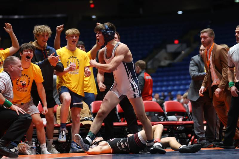 Yorkville Christian’s Isaac Bourge celebrates a win over Tremont’s Chase Stedman in the Class 1A 120 pound dual team championship match at Grossinger Motor Arena in Bloomington. Saturday, Feb. 26, 2022, in Champaign.