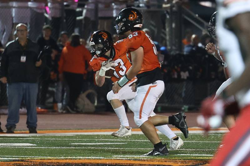 Lincoln-Way West’s Joey Campagna heads upfield after a catch against Bolingbrook on Friday, Sept. 22 in New Lenox.
