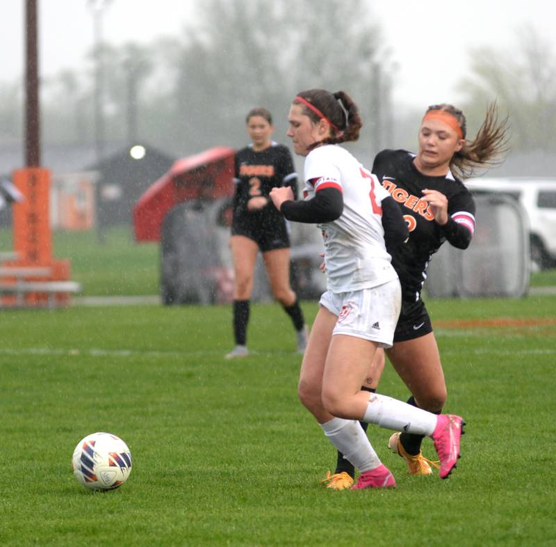 Oregon's Anna Stender (2) dribbles as Byron's Delaney Henert (22) gives chase on Thursday, April 18, 2024 at Byron High School.