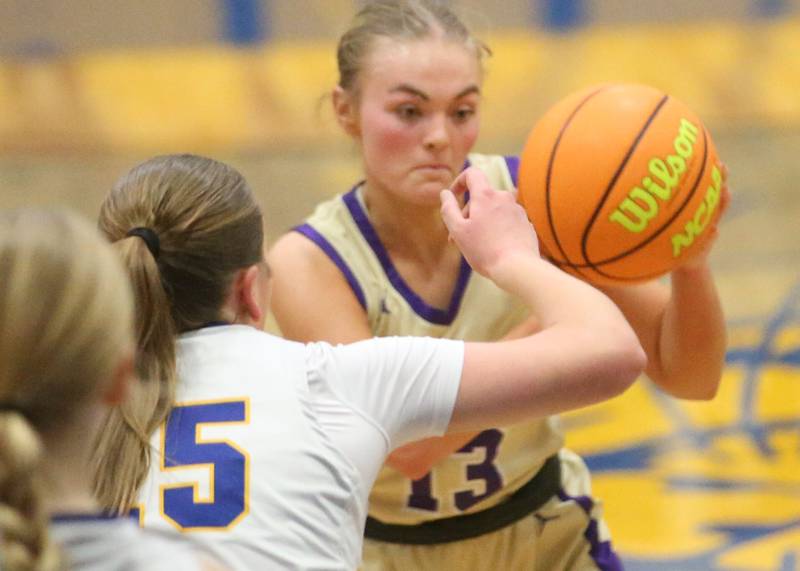 Serena's Brynley Glade dribbles around Somonauk/Leland's Kiley Mason on Monday, Feb. 10, 2025 at Somonauk High School.