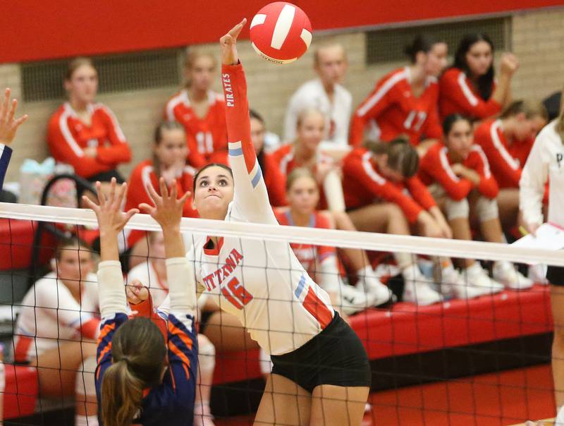 Ottawa's Bella Knoll spikes the ball past Pontiac's Lila Donovan on Tuesday, Sept. 9, 2025 at Kingman Gymnasium.