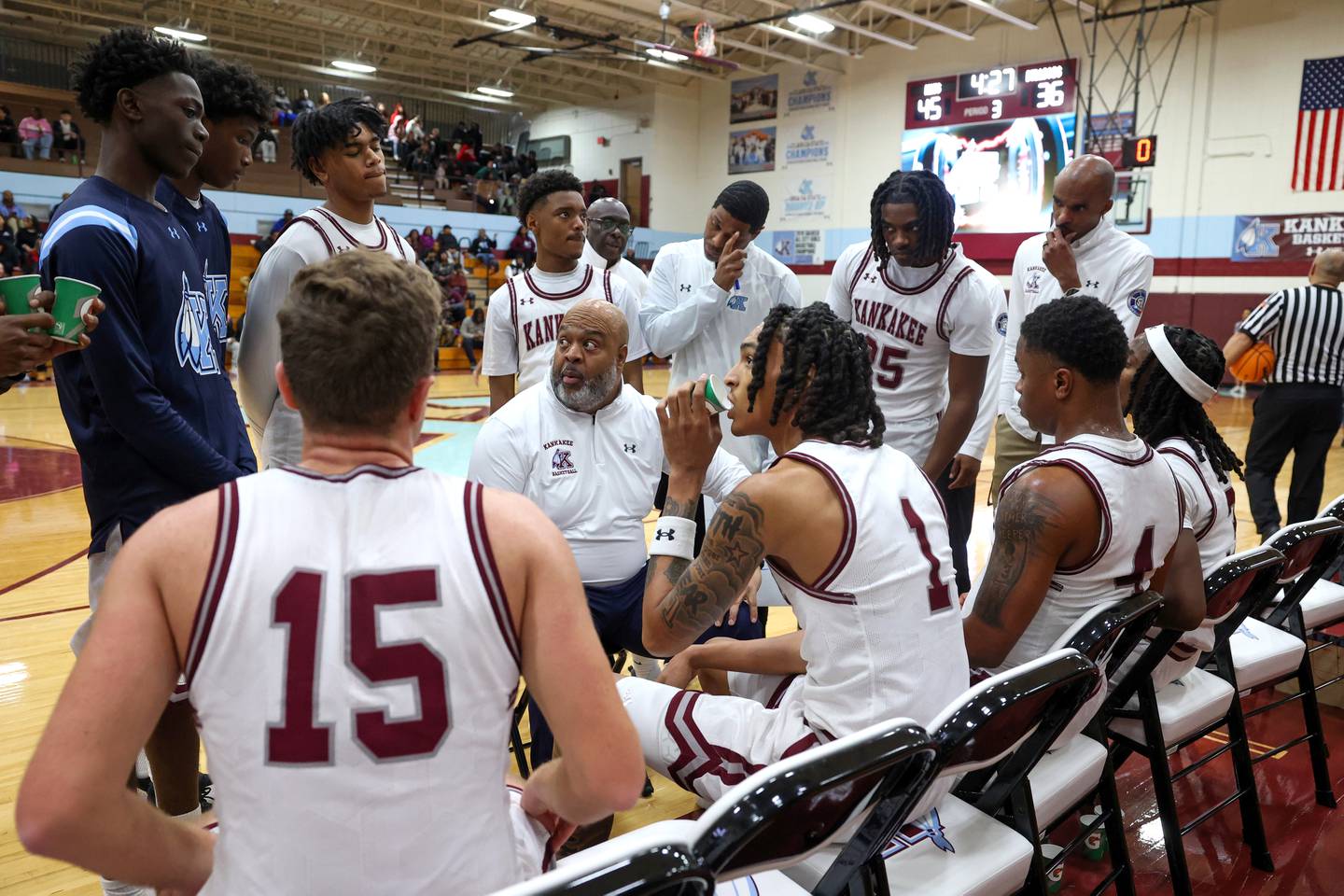 Kankakee head coach Chris Pickett speaks to players in a timeout during the Kays' 74-60 victory over Mahomet-Seymour on Tuesday, Dec. 2, 2025.