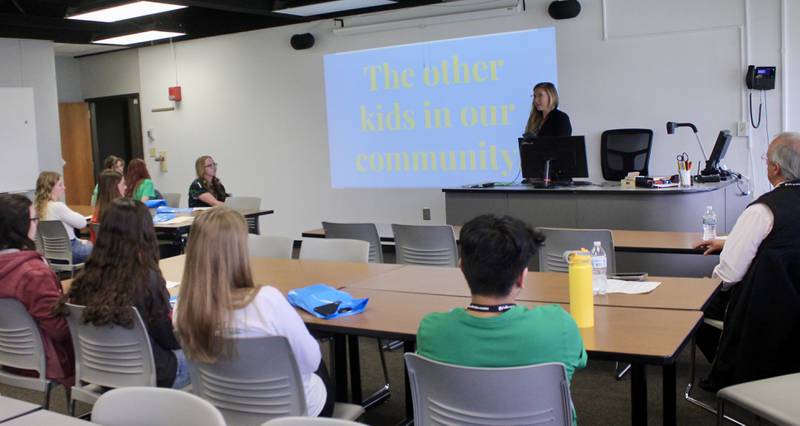 High school students taking part in the Pathways Education Symposium listen to a presentation about elementary education from Chelsea Stuart (at the desk) and Narcisco Puentes (far right) at Sauk Valley Community College on Friday, April 21, 2023.