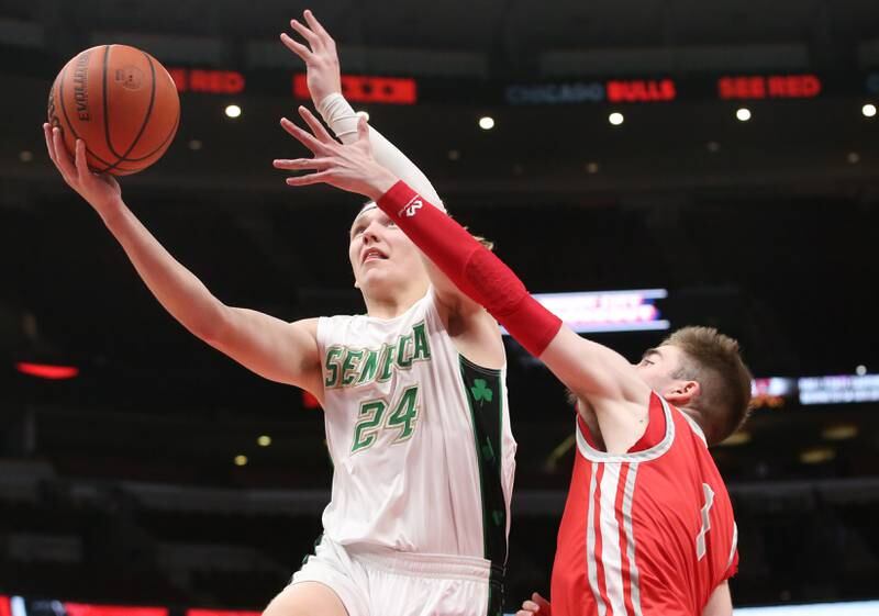 Seneca's Grant Siegel drives to the hoop as Streator's Cade Peterson defends during a game on Tuesday, Dec. 21, 2023 at the United Center in Chicago.