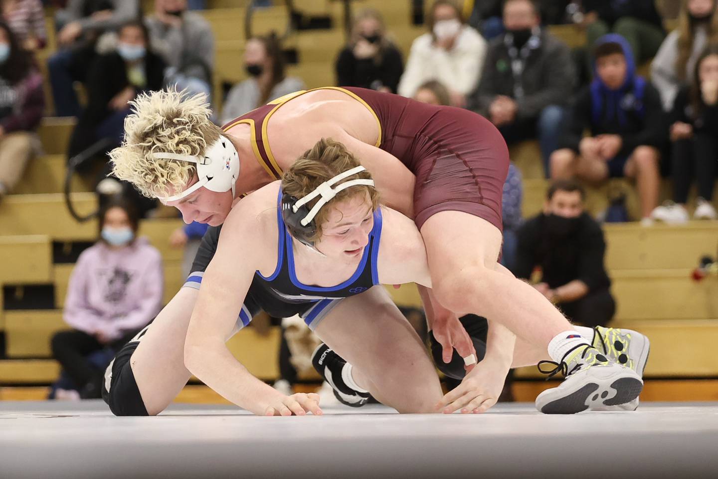 Lockport's Brayden Thompson moves over Lincoln-Way East's Gavin Jones in the 182lb match. Thursday, Jan. 20, 2022 in Lockport.