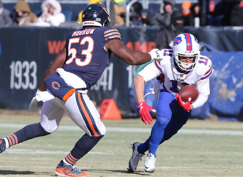 Buffalo Bills wide receiver Cole Beasley tries to get by Chicago Bears linebacker Nicholas Morrow after a catch during their game Sunday, Dec. 24, 2022, at Soldier Field in Chicago.