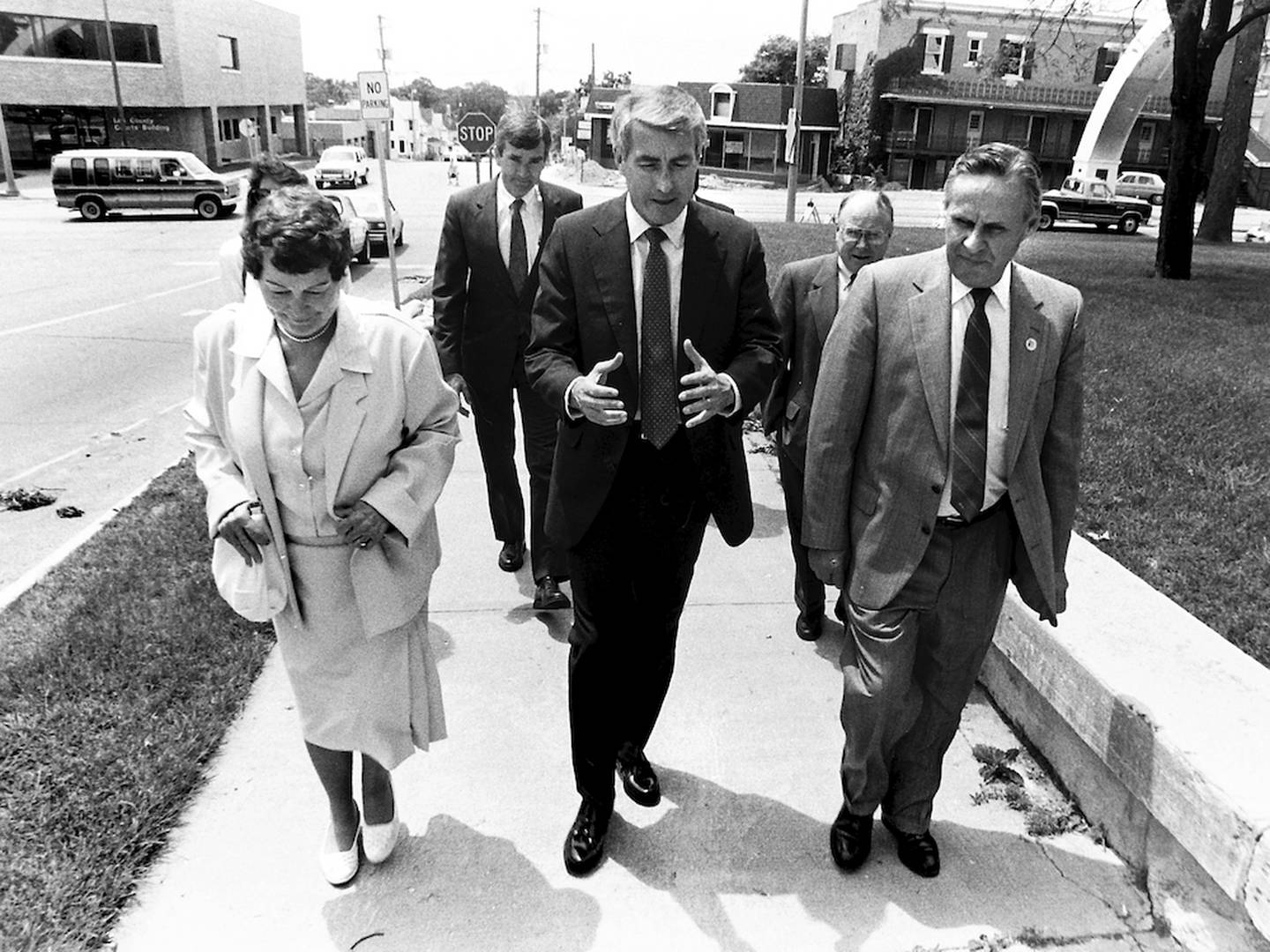 In a photo taken June 11, 1990, Illinois Secretary of State Jim Edgar (center, foreground) chats with Lee County Clerk Rosemary Emmert and state Rep. Myron Olson, a Dixon Republican. In the background are Lee County Republican Chairman Tom Shaw (left) and state Sen. Harlan Rigney, a Freeport Republican. Edgar spoke to the Rotary Club, made brief stops at both Lee County courthouses, and traveled to Sterling to tour Northwestern Steel and Wire Co. A Gazette editorial from June 13, 1990, took Edgar to task for his opposition to a lawsuit regarding the state funding of education. Edgar, a Republican, was elected governor in November 1990 and re-elected in 1994.