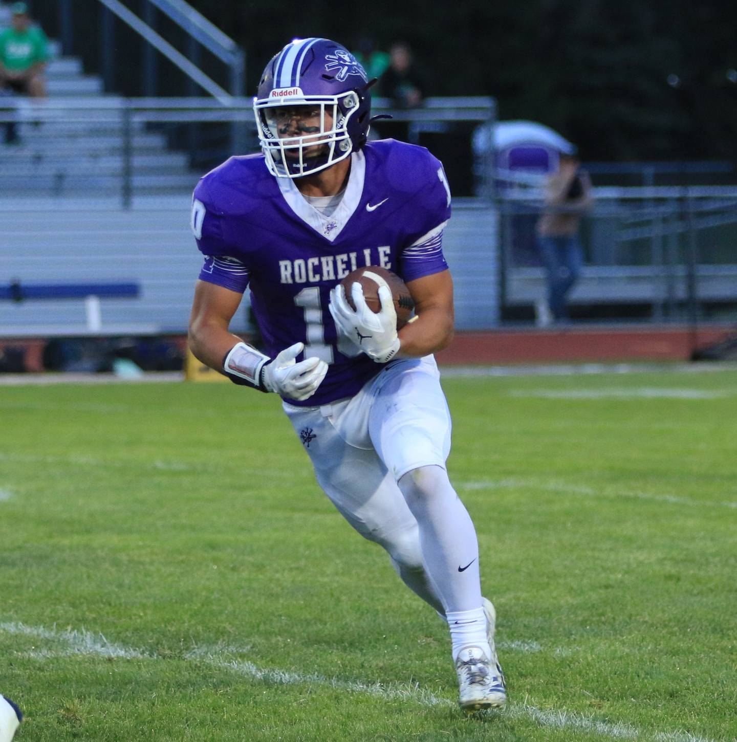 Rochelle's Dylan Manning runs for extra yards during their game with Geneseo on Friday, Aug. 29.