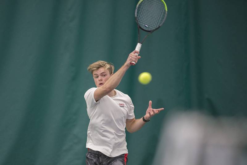 Sauk Valley College's Preston Engel returns a shot during a doubles match with dad Corey Saturday, April 2, 2022 at Westwood in Sterling. The father-son duo took on Milwaukee Area Tech's Josh Zaborski and Tim Haspel.