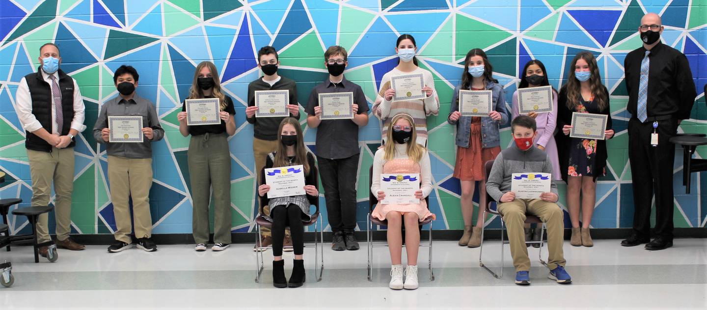 William B. Orenic Assistant Principal Jason Kucera (top left) and Troy Middle School Assistant Principal Mark Peter (top right) present the November 2021 Troy Community School District 30-C Students of the Month.