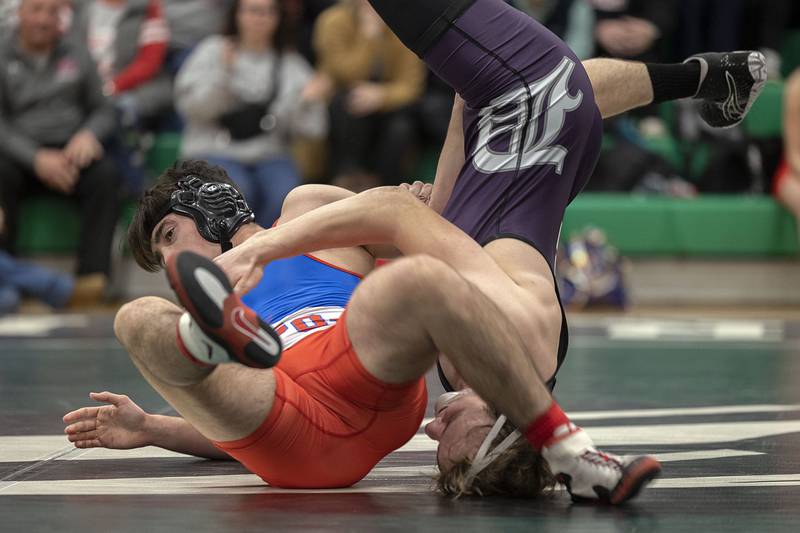 Oregon’s Anthony Bauer and Dixon’s Jayce Kastner wrestle at 160 pounds Thursday, Jan 19, 2023 in Rock Falls.