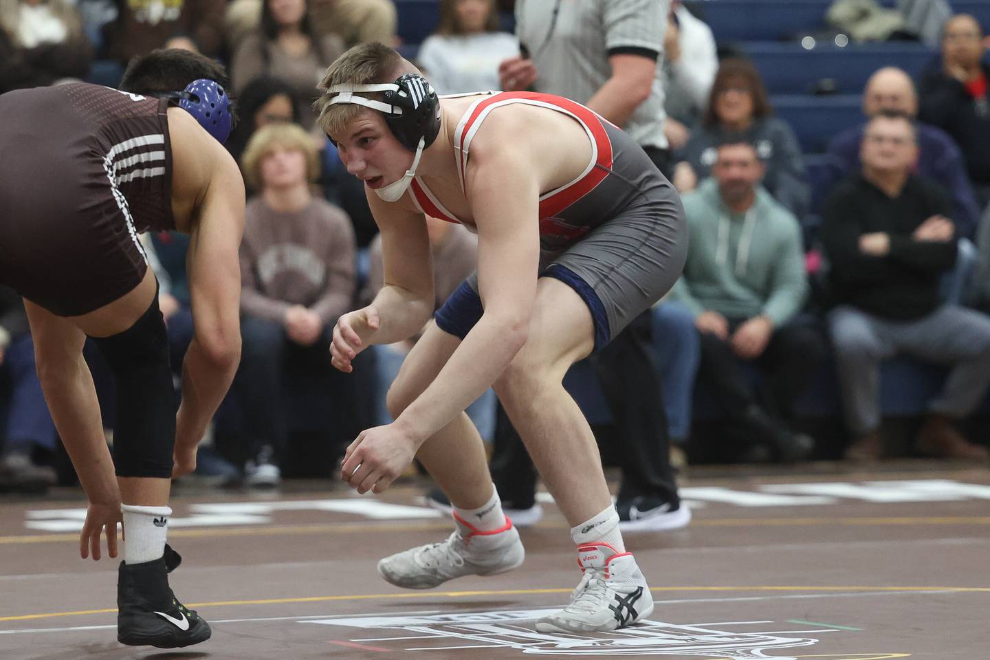 Marian Central’s Jimmy Mastny faces off with Joliet Catholic’s Luke Hamiti in the tri-meet at Joliet Catholic on Thursday, Jan. 18th, 2024 in Joliet.