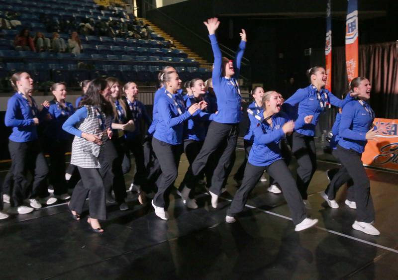 Members of the Burlington Central dance team react after winning the Class 2A third-place during the IHSA State Dance finals on Saturday, Feb. 1, 2025 at Grossingers Motor Arena in Bloomington.