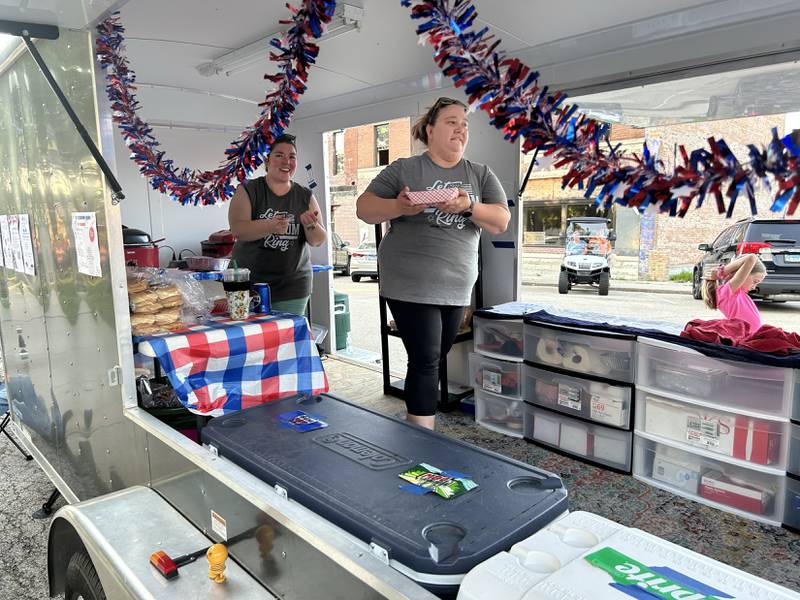 Jenniger Robinson and Tiffany West were busy selling sandwiches and soft drinks at the Let Freedom Ring booth at the Mt. Morris Jamboree on Friday, June 20, 2025. Proceeds will be used toward the annual Fourth of July celebration, Let Freedom Ring, in Mt. Morris. This year's event will be held July 2-5 in Mt. Morris.