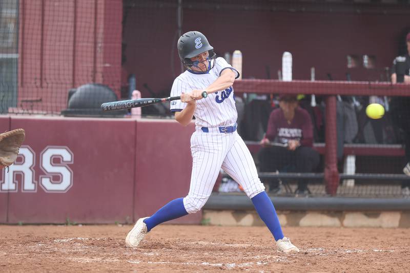 Lincoln-Way East’s Grace Duncan locks in on a pitch for a two run single against Lockport on Monday, April 13, 2026 in Lockport.
