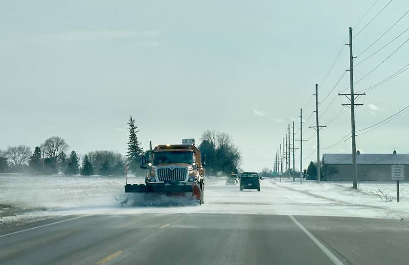 A Illinois Department of Transportation snow plow pushes snow along Route 89 on Monday, Nov. 27, 2023 in Spring Valley. The Route 89 corridor was listed as a hazardous road for travel due to the blowing and drifting conditions that created icy roadways.