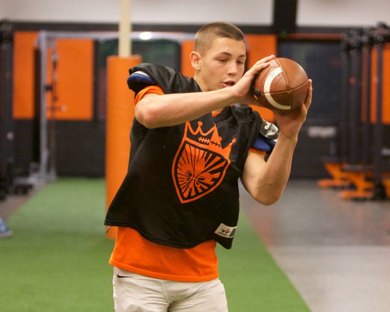 St. Charles East's Leo Bolsoni works on catching drills on Monday, Aug.18,2025 in St. Charles.