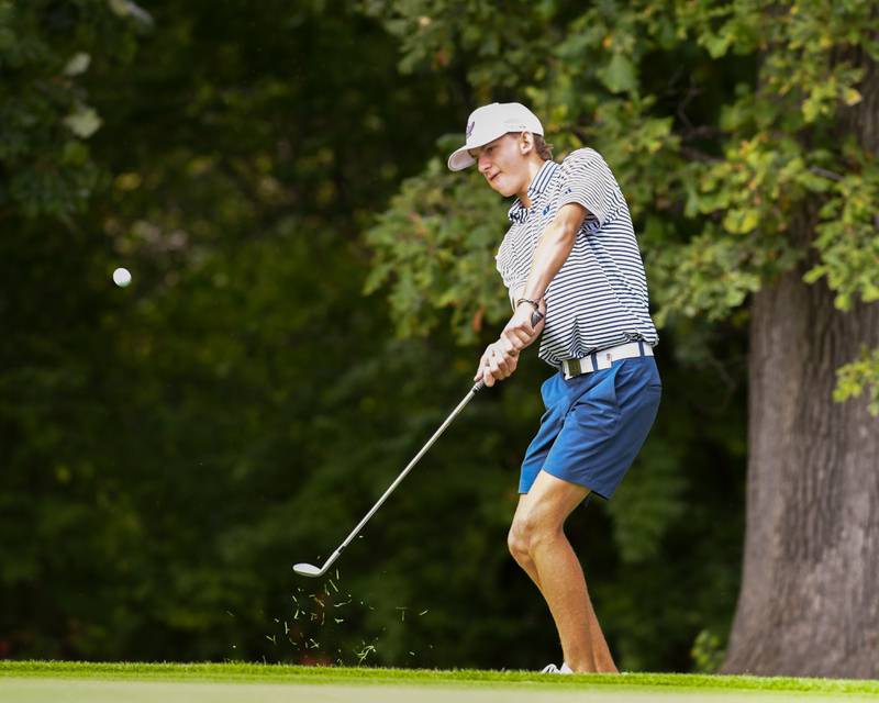 Carter Anderson of Oswego chips onto the green during the Plainfield Central regional on Wednesday Oct. 1, 2025, held at Wedgewood Golf Course in Plainfield.