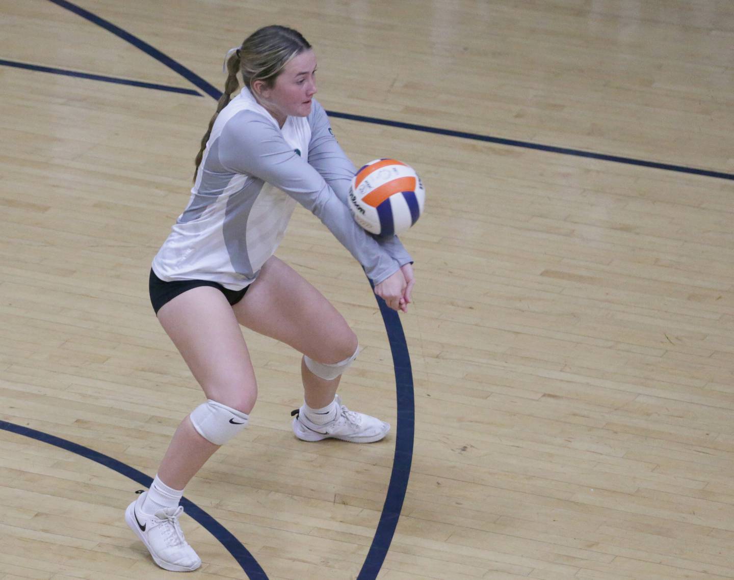 St. Bede's libero Ella Hermes (22) hits the ball against Marquette on Monday, Oct. 17, 2022 at Bader Gymnasium in Ottawa.