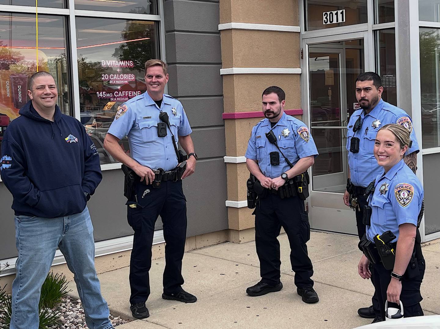 Several Joliet police officers attend the Dunkin' Cop on a Rooftop event on Friday, May 15, 2026, in Joliet.