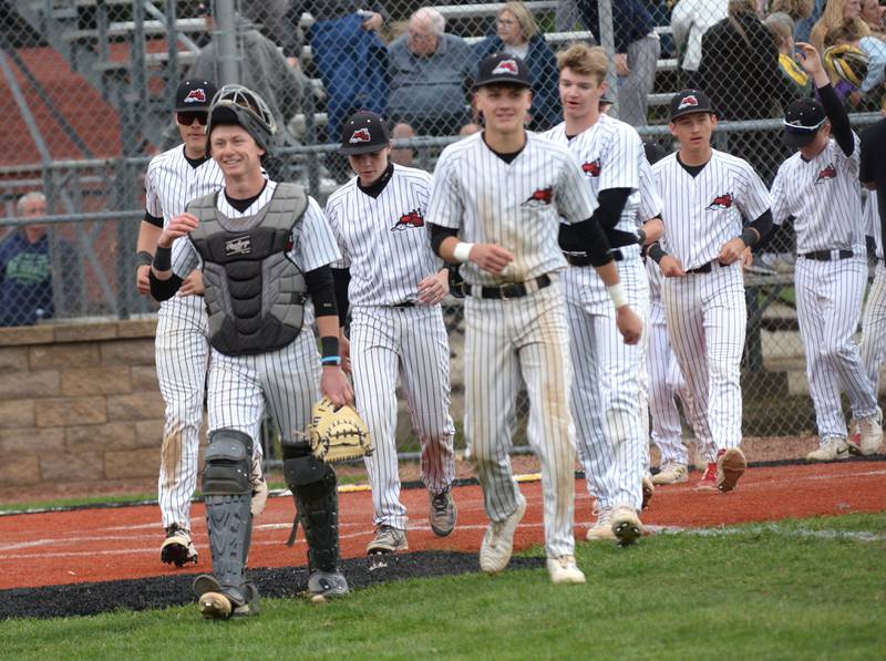 Fulton players smile after shaking hands with Rockford Lutheran at the 1A Lena-Winslow Sectional on Wednesday, May 28, 2025.. The Steamers won the game 4-1 to advance to the sectional final.