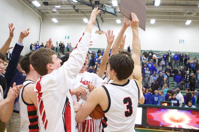 Benet celebrates the Win over Geneva at the Class 4A Sectional Final at Bartlett on Friday, March 3, 2023.