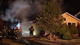 Firefighter sustains minor injury from McHenry structure fire