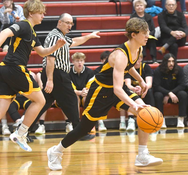 AFC's Otto Horner brings the ball up the court against Forreston on Saturday, Jan. 17, 2026 at Forreston High School.
