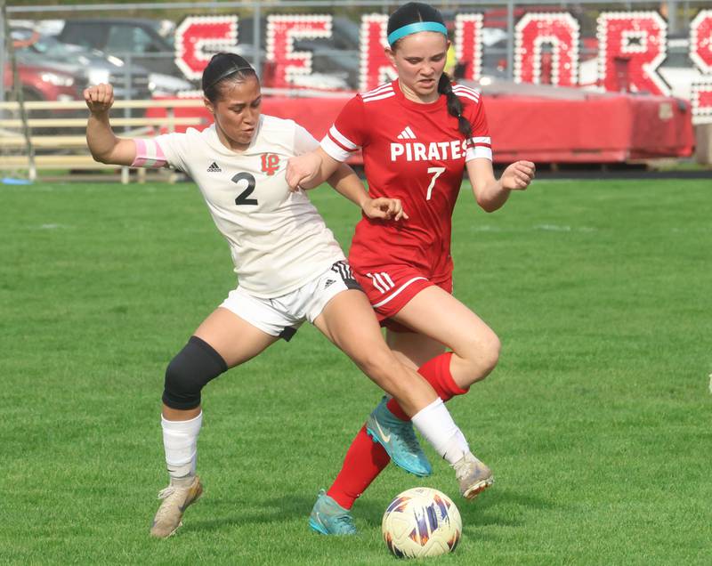 L-P's Vicky Tejada goes after the ball with Ottawa's Georgia Kirkpatcick on Monday, April 13, 2026 on King Field at Ottawa High School.
