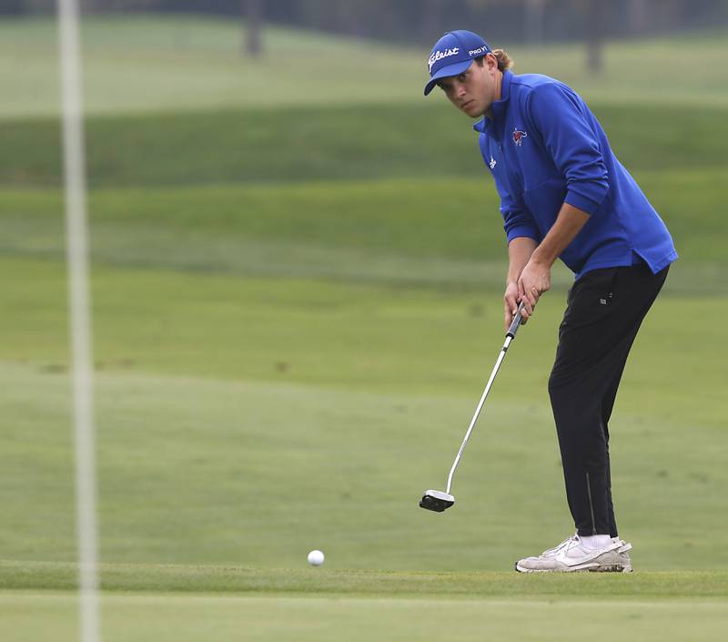 Dundee-Crown’s Jack Sundstedt putts on the eighth green during the IHSA Class 3A Hampshire Regional golf tournament on Wednesday, Sept. 27, 2023, at Randall Oaks Golf Club in West Dundee.