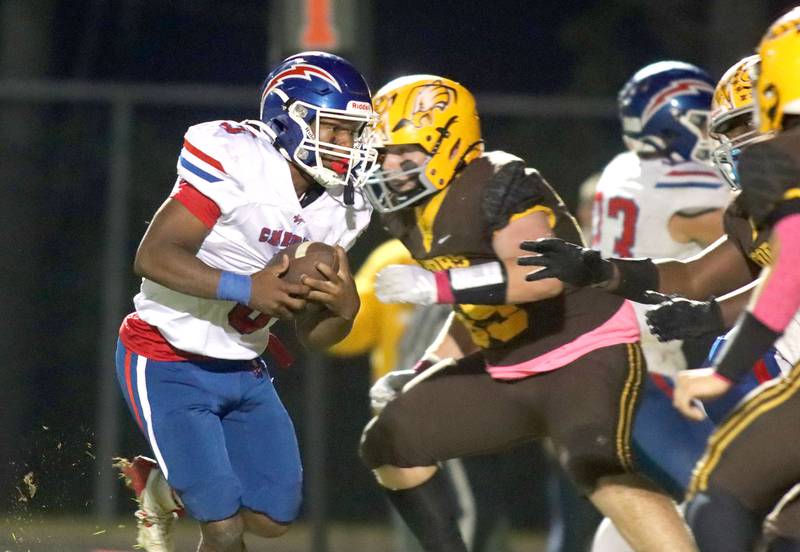 Dundee-Crown’s Kadin Malone runs the ball in varsity football  at Jacobs High School in Algonquin on Friday, Oct. 10, 2025.