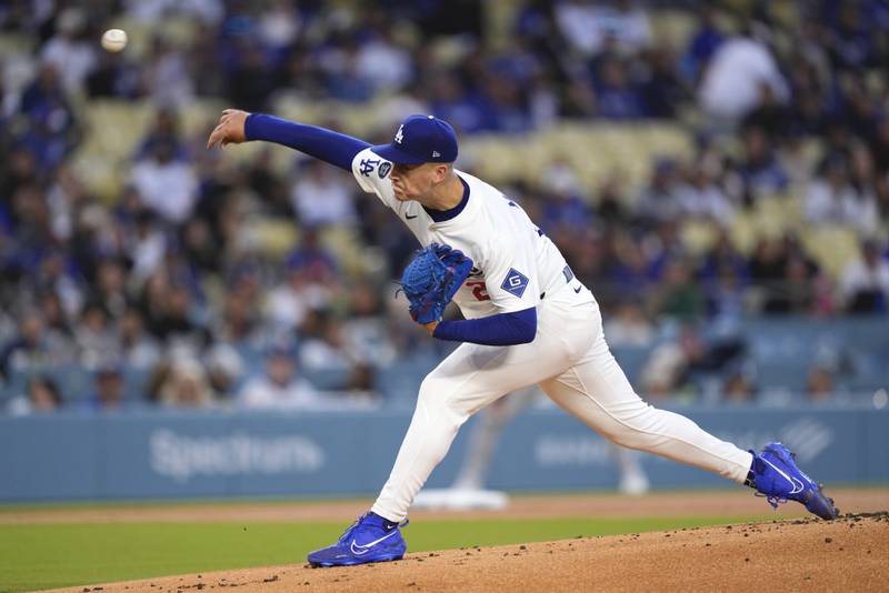 Los Angeles Dodgers starting pitcher Bobby Miller throws to the plate during the first inning of a baseball game against the Colorado Rockies Wednesday, April 16, 2025, in Los Angeles. (AP Photo/Mark J. Terrill)