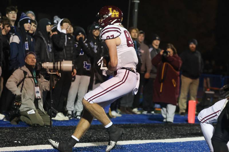 Loyola’s Brendan Luftos secures the ball after a catch for the touchdown against Lincoln-Way East in the Class 8A semifinal on Saturday, Nov. 23, 2024 in Frankfort.