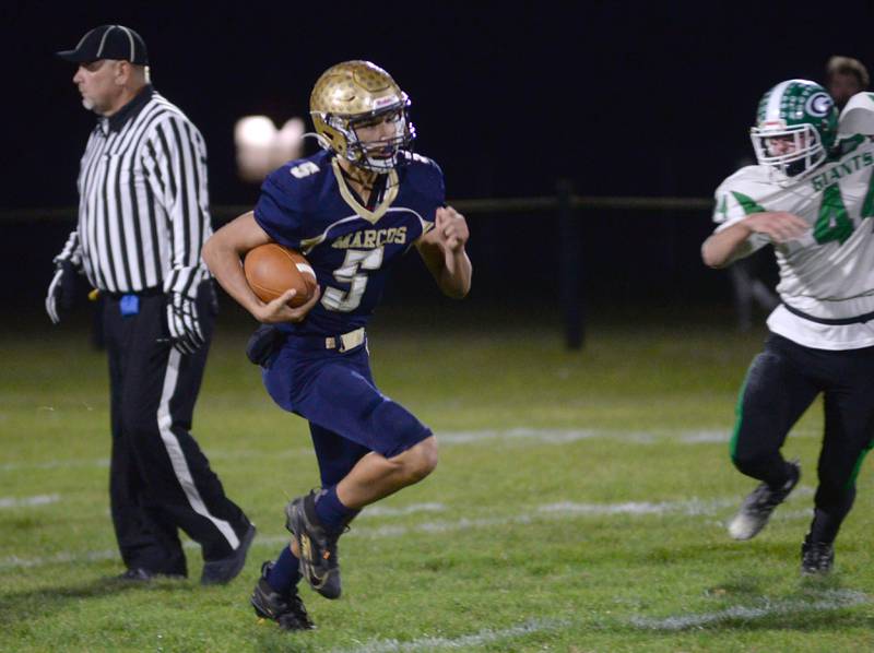 Polo's Gus Mumford (5) runs with the ball during 8-man playoff action against Alden-Hebron on Friday, Nov. 1, 2024 in Polo.
