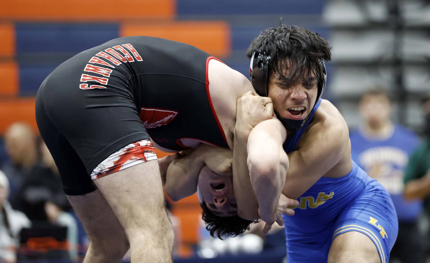 Vince Bern of Naperville Central wrestles Jesse Nunez-Garcia of Lyons at 150-pounds during the IHSA Class 3A Boys Regional Wrestling Tournament Saturday, Jan. 31, 2026 in Naperville at Naperville North High School.