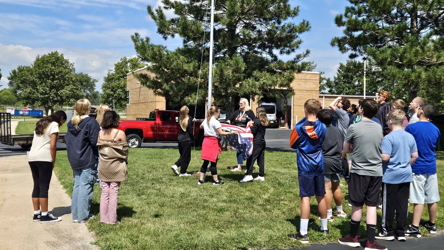 Morris Grade School eighth-grade teacher Amy Lindenborn teaches the U.S. flag code as part of her history, social studies and civics course. 2025