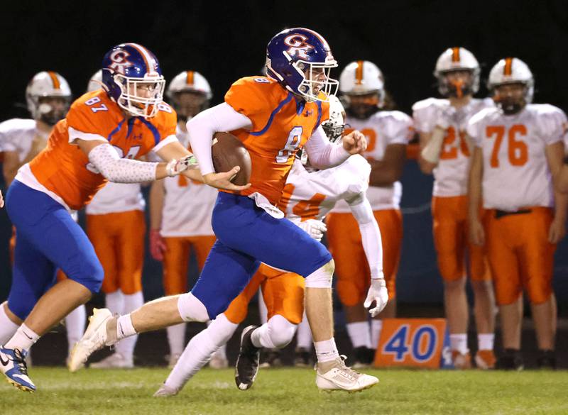 Genoa-Kingston's Nathan Kleba runs by the Winnebago defense for a long touchdown during their game Friday, Sept. 27, 2024, at Genoa-Kingston High School.