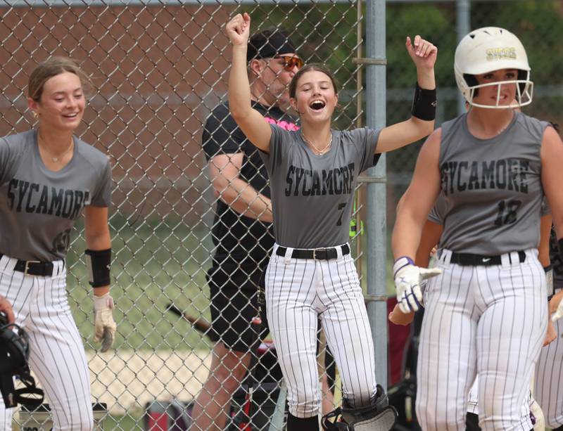 Sycos players celebrate after teammate Jasmine Rodriguez homers Friday, June 27, 2025, during their 16u game against Select Fastpitch in the Storm Days tournament at the Sycamore Community Sports Complex.