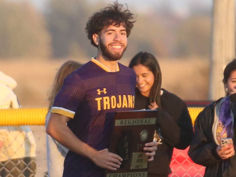Mendota's David Casas reacts while holding the Class 1A Regional plaque after defeating Princeton on Tuesday, Oct. 22, 2024 at Serena High School.