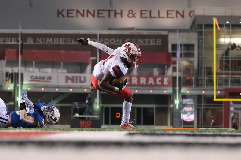 St. Rita's B.J. Hall makes a play after the catch against Wheaton North in the Class 7A state championship Nov. 27, 2021 at NIU's Huskie Stadium in DeKalb.