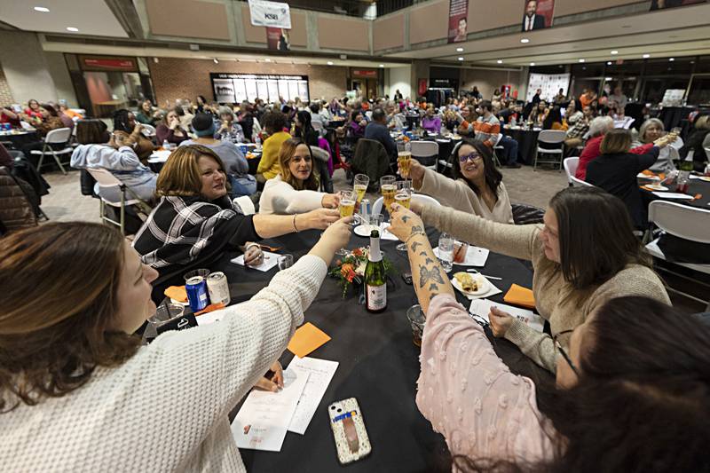 A toast rings out at SVCC in celebration of 100 years of Sauk Valley’s YWCA Friday, Jan. 19, 2024.