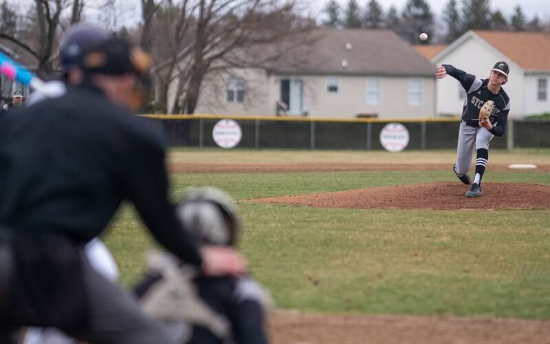 Sycamore's Ethan Storm (3) delivers a pitch against Plano during a baseball game at Plano High School on Monday, April 4, 2022.