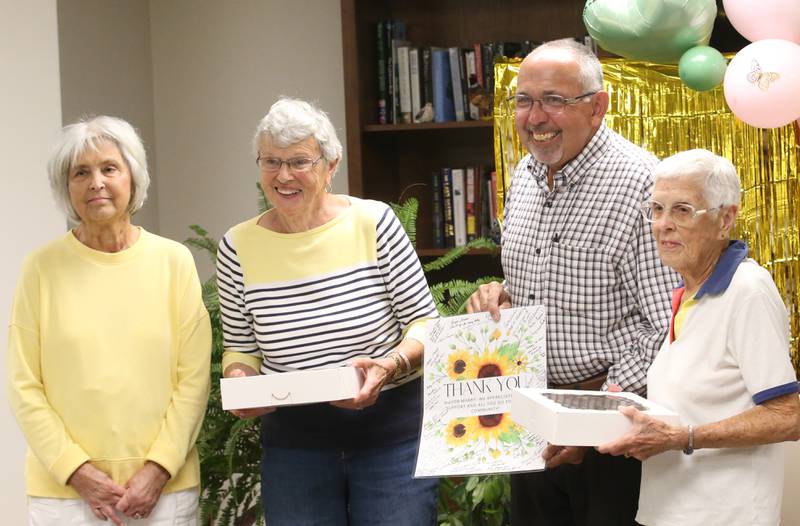 (From left) Pat Reinhardt, Betty McComber, Princeton Mayor Ray Mabry and Neva Lucas give a thank you card and sweets to Princeton Mayor Ray Mabry during Gorgeous Grandma Day on Wednesday, July 23, 2025 at the Greenfield Retirement Home in Princeton. Mayor Mabry spoke to the residents, handed out rubber ducks and told stories about Princeton. a day to honor and appreciate grandmothers, recognizing their beauty, wisdom, and the important role they play in families and communities. The day encourages people to show their love and gratitude to grandmothers and to celebrate women of all ages who embrace the spirit of a "gorgeous grandma".