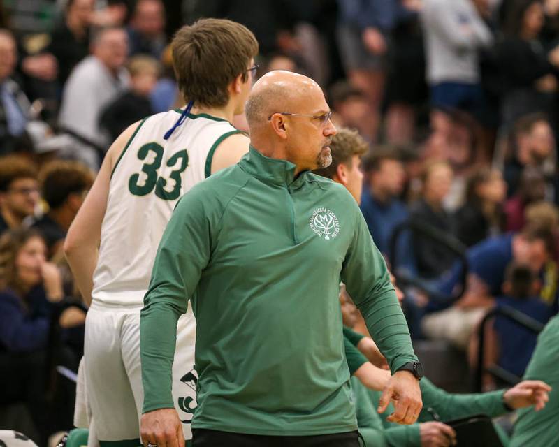Bishop Mcnamara's head coach Adrian Provost looks on during their Class 2A Seneca Sectional final basketball game between Bishop McNamara at Yorkville Christian, March 6, 2026 in Senaca.