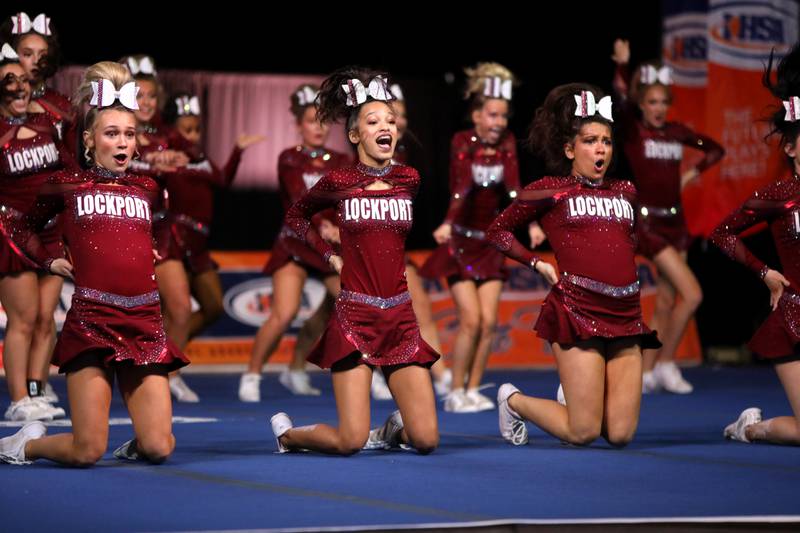 Members of the Lockport cheerleading team compete in the large team division of the IHSA State Finals on Saturday, Feb. 8, 2025 at Grossinger Motors Arena in Bloomington.