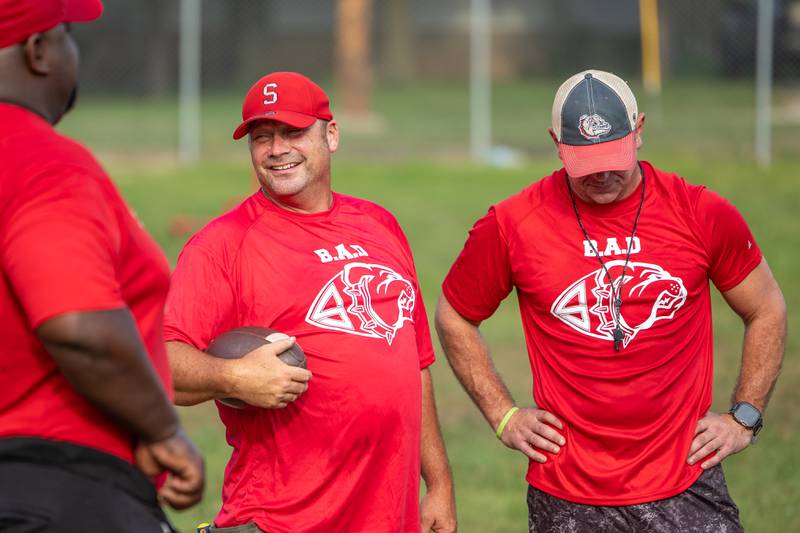 (left to right) Coaches Jason Schultz smiles as Jeremy Wachowski of Streator stands by during practice on Monday, August 11, 2025 at Streator High School in Streator.